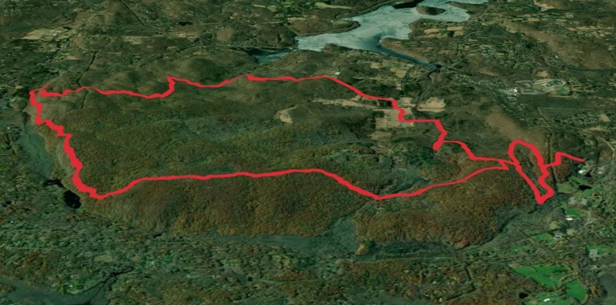 An image depicting the trail Pine Forest and Rock Trail Loop - Lewisboro Town Park and its surrounding area.