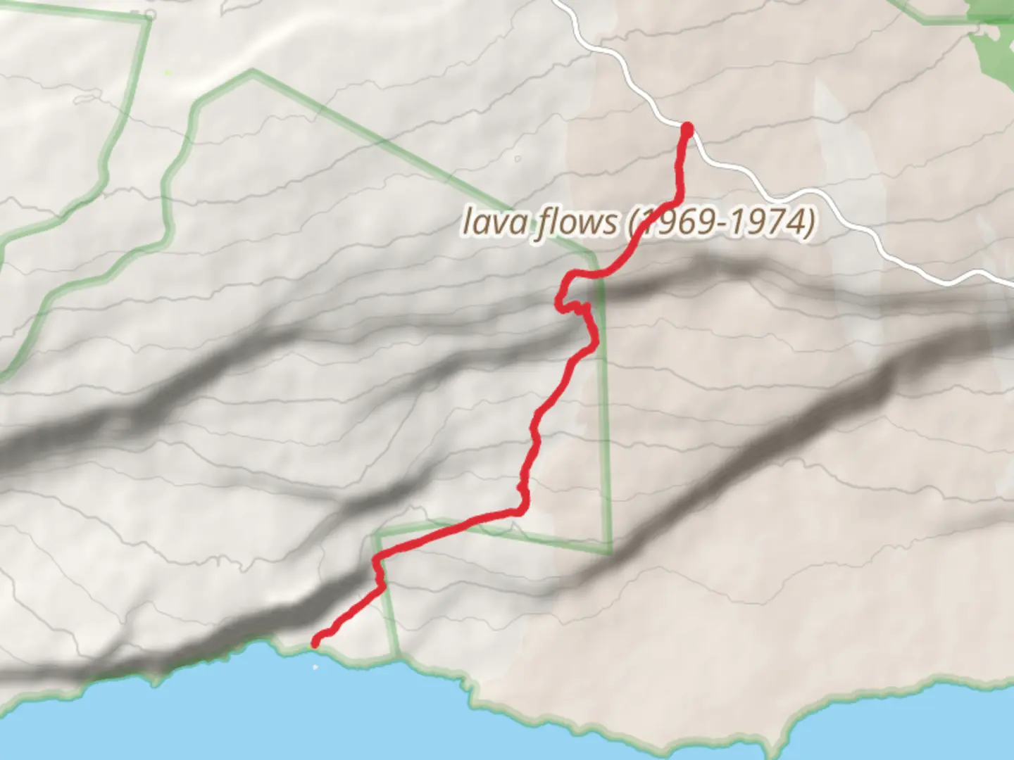 An image depicting the trail Pu'ukapukapu from Chain of Craters Road and its surrounding area.