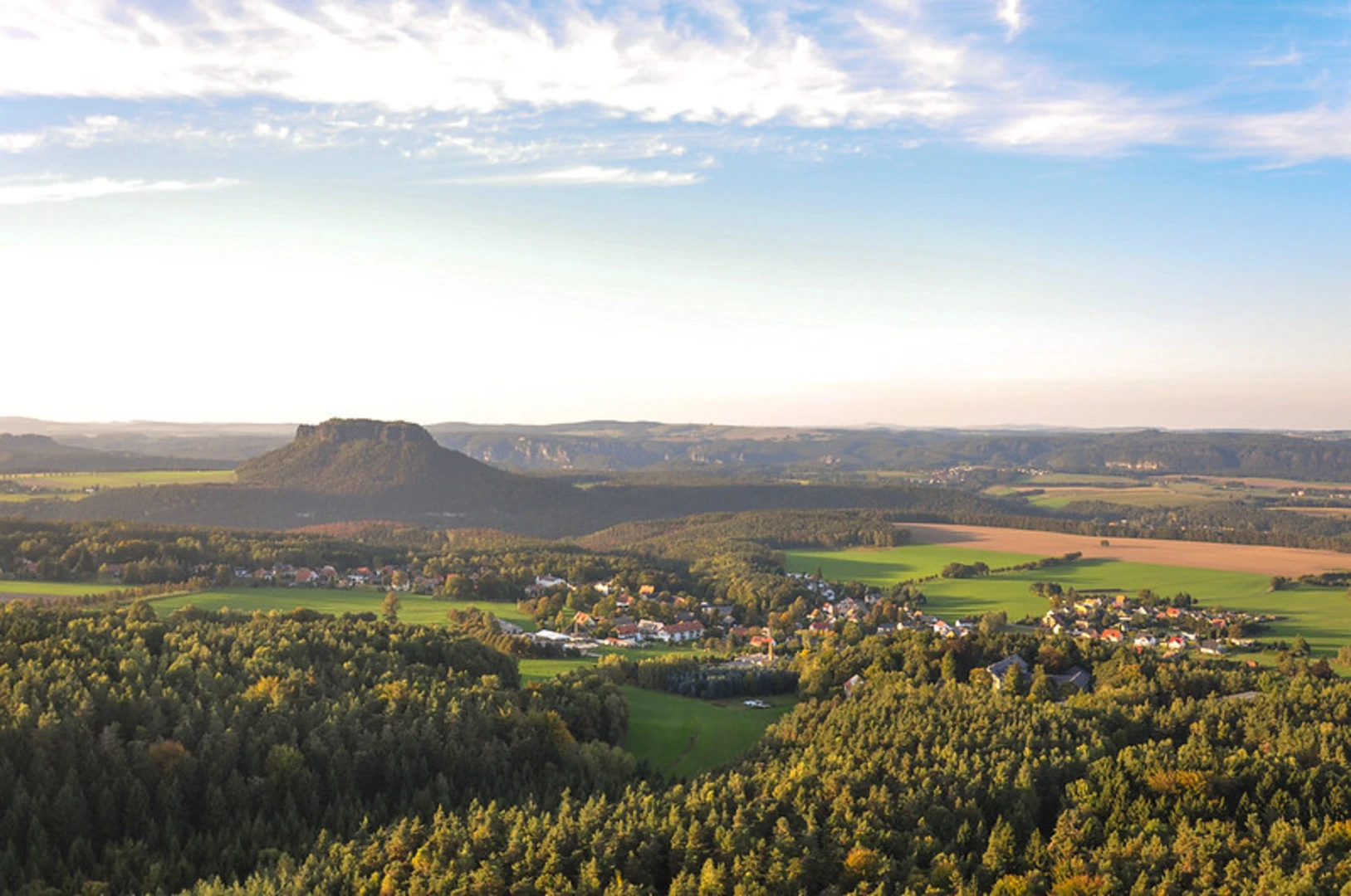 An image depicting the trail Gohrisch and Papststein Walk via Malerweg and its surrounding area.