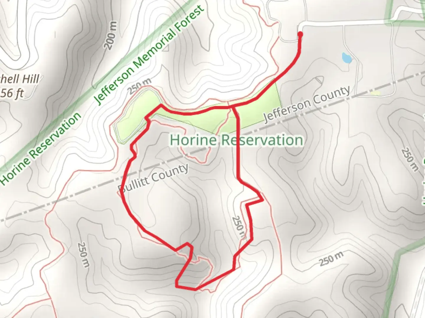 An image depicting the trail Horine Campground Service Road - Orange Loop Trail and its surrounding area.