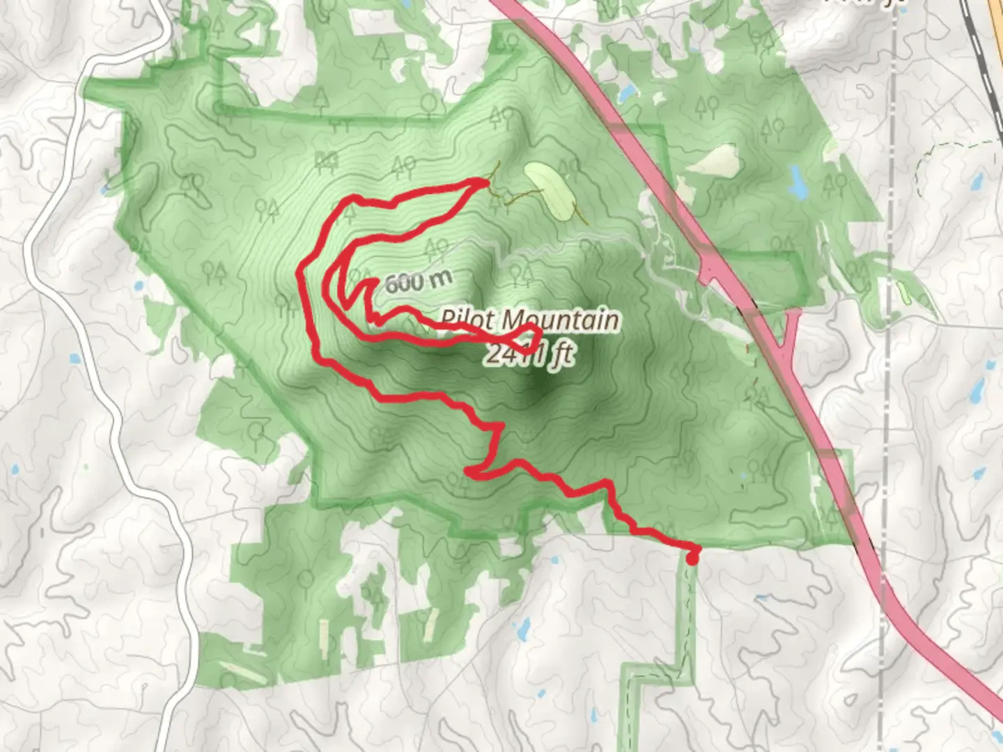 An image depicting the trail Pilot Mountain via Grindstone Trail and Ledge Spring Trail and its surrounding area.