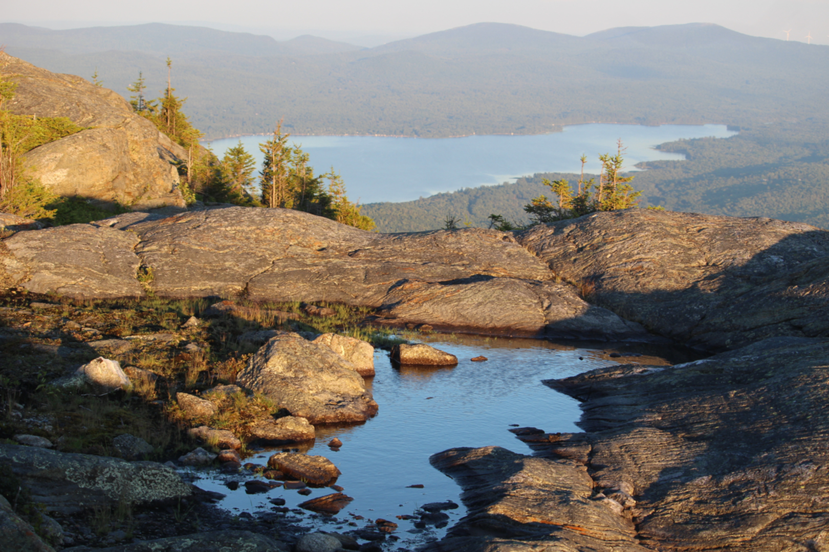 An image depicting the trail Tumbledown Mountain Trail Loop and its surrounding area.
