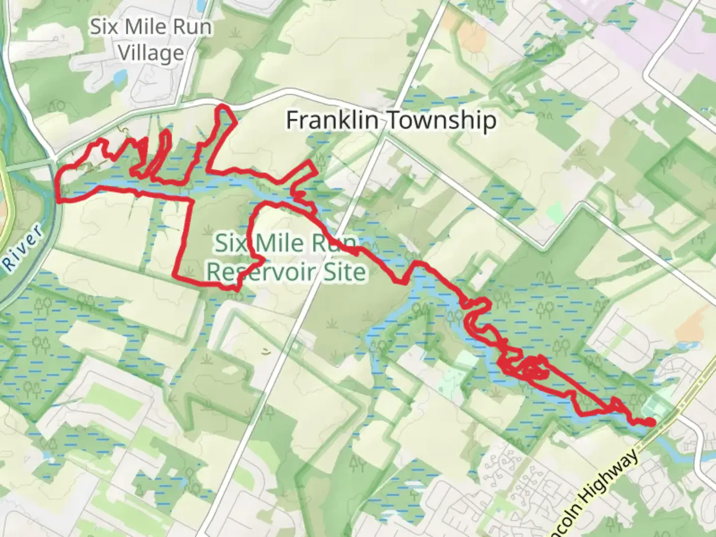 An image depicting the trail Red, Orange and Blue Trail - Six Mile Run and its surrounding area.