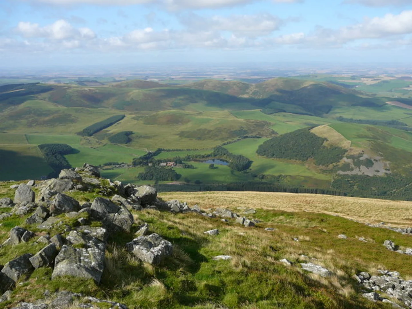 An image depicting the trail Wester Tor from Hethpool and its surrounding area.