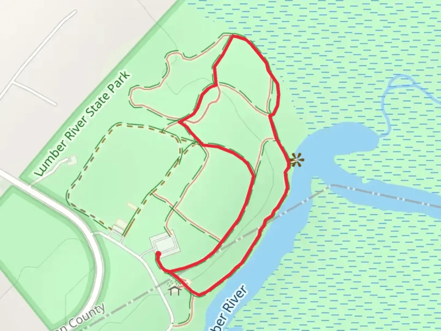 An image depicting the trail Britt Cemetery Loop near Lumber River and its surrounding area.