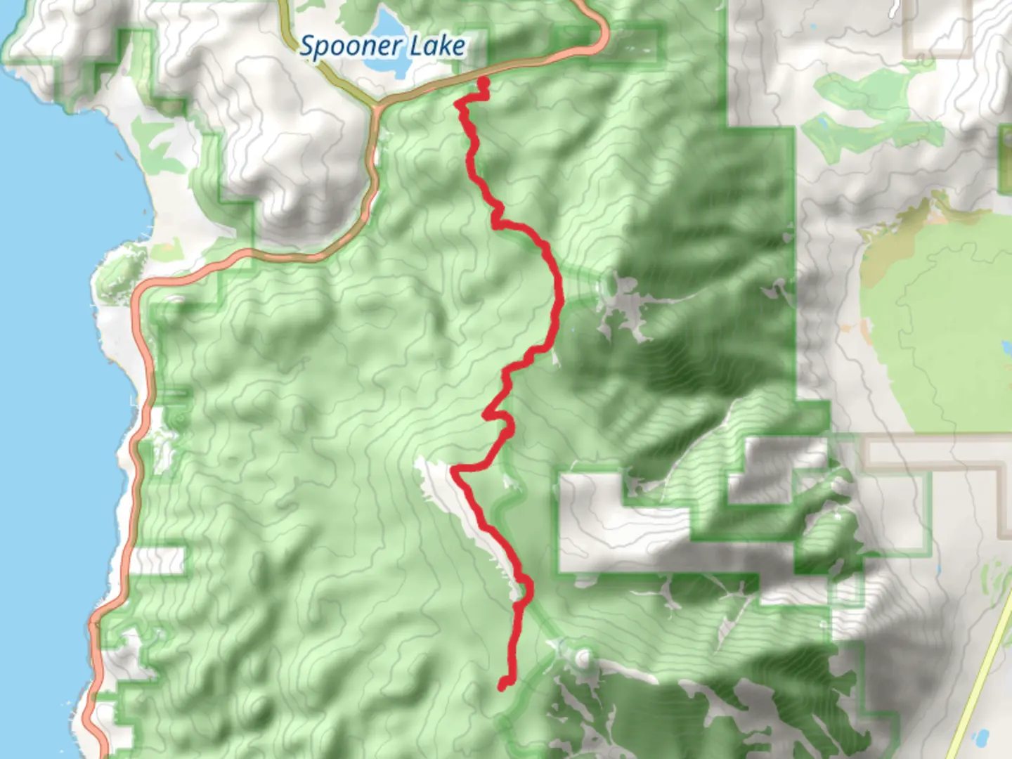 An image depicting the trail Tahoe Rim Trail from Spooner Lake and its surrounding area.
