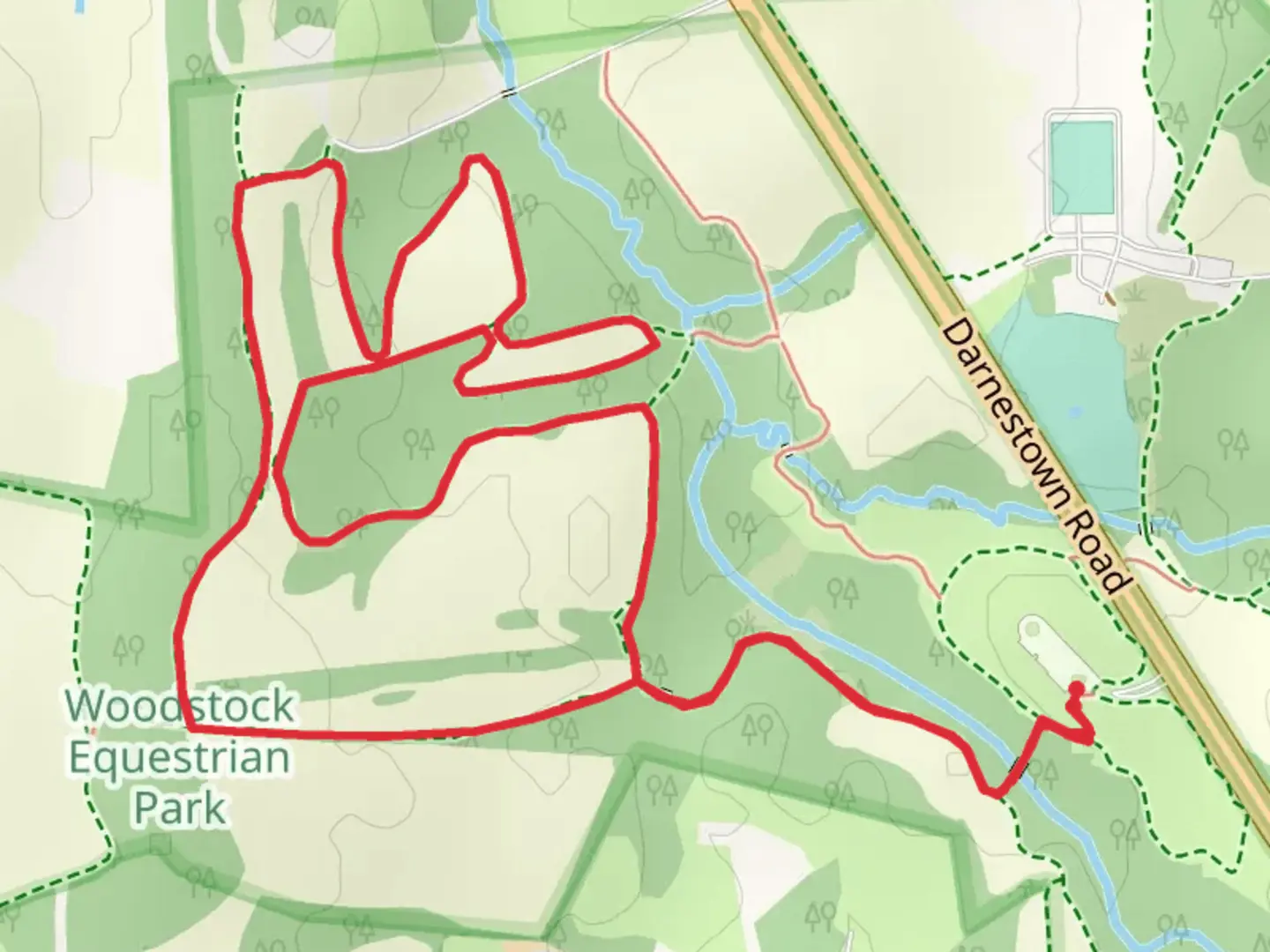 An image depicting the trail Greenburg Challenge Loop via Two Bridges Trail and its surrounding area.