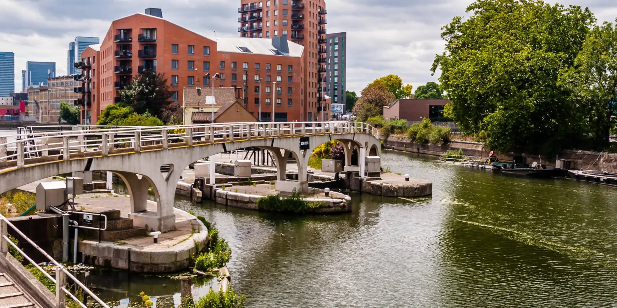 An image depicting the trail The Limehouse Cut from Bow Locks and its surrounding area.
