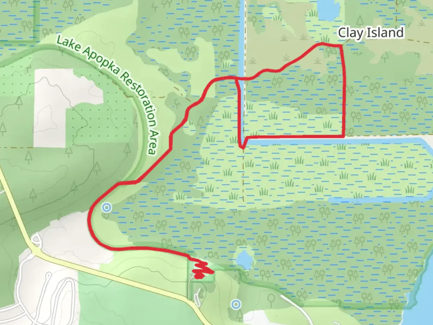 An image depicting the trail Lake Apopka Loop Trail and its surrounding area.