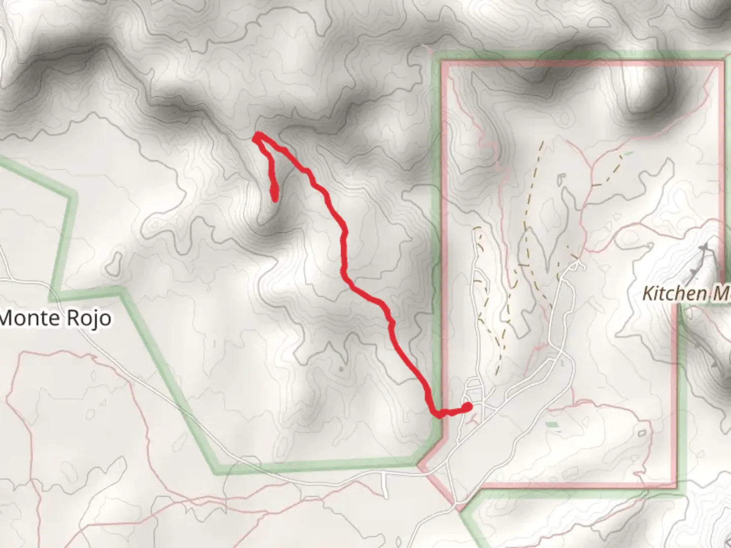 An image depicting the trail Ghost Ranch - Chimney Rock Trail and its surrounding area.