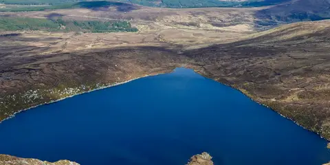 An image depicting the trail Lough Ouler Circular and its surrounding area.