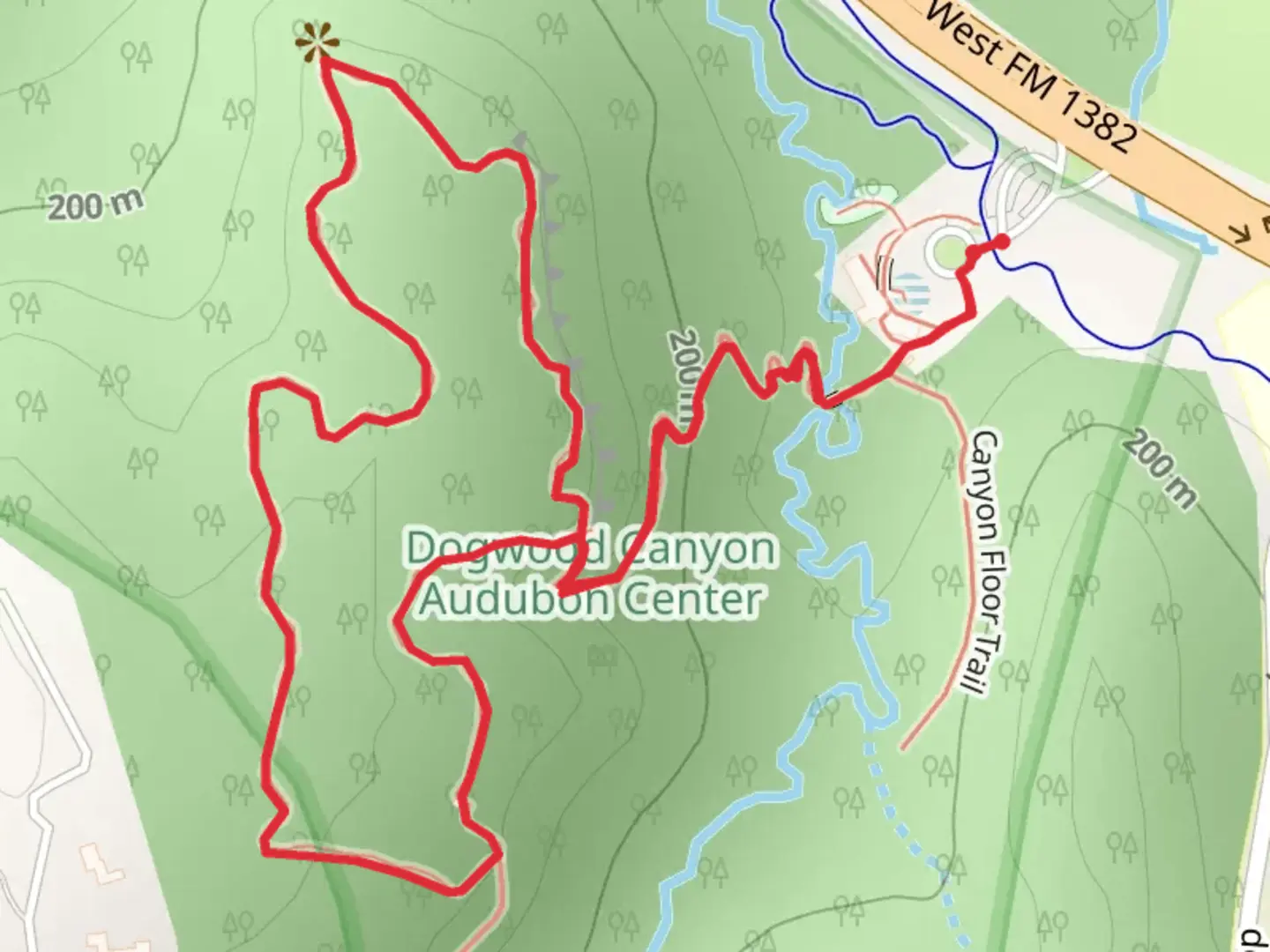 An image depicting the trail Dogwood Canyon Audubon Center Loop and its surrounding area.