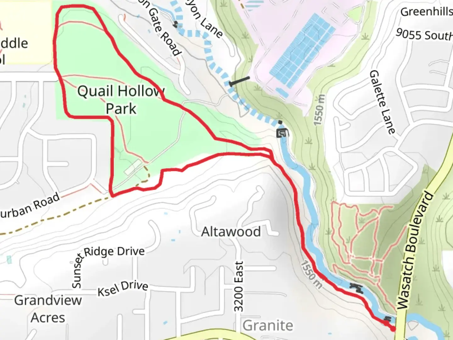 An image depicting the trail Quail Hollow Park Trail and its surrounding area.