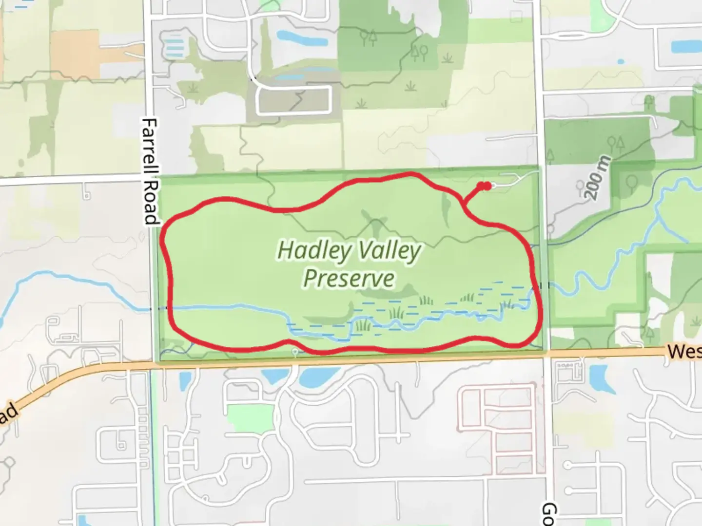 An image depicting the trail Spring Creek Greenway Loop and its surrounding area.
