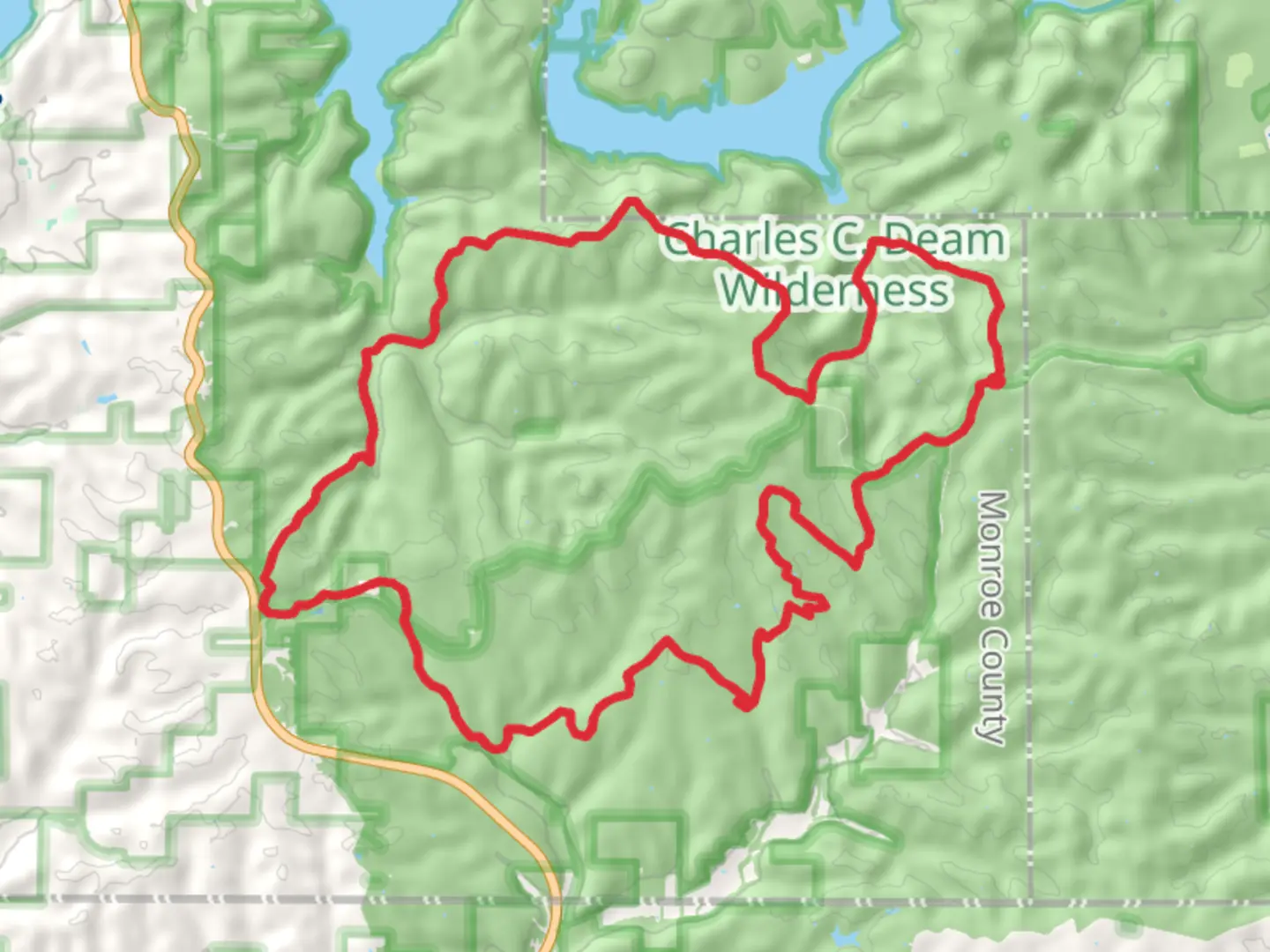 An image depicting the trail Axsom Branch, John Grubb Ridge, Hayes and Cope Hollow Loop Trail and its surrounding area.