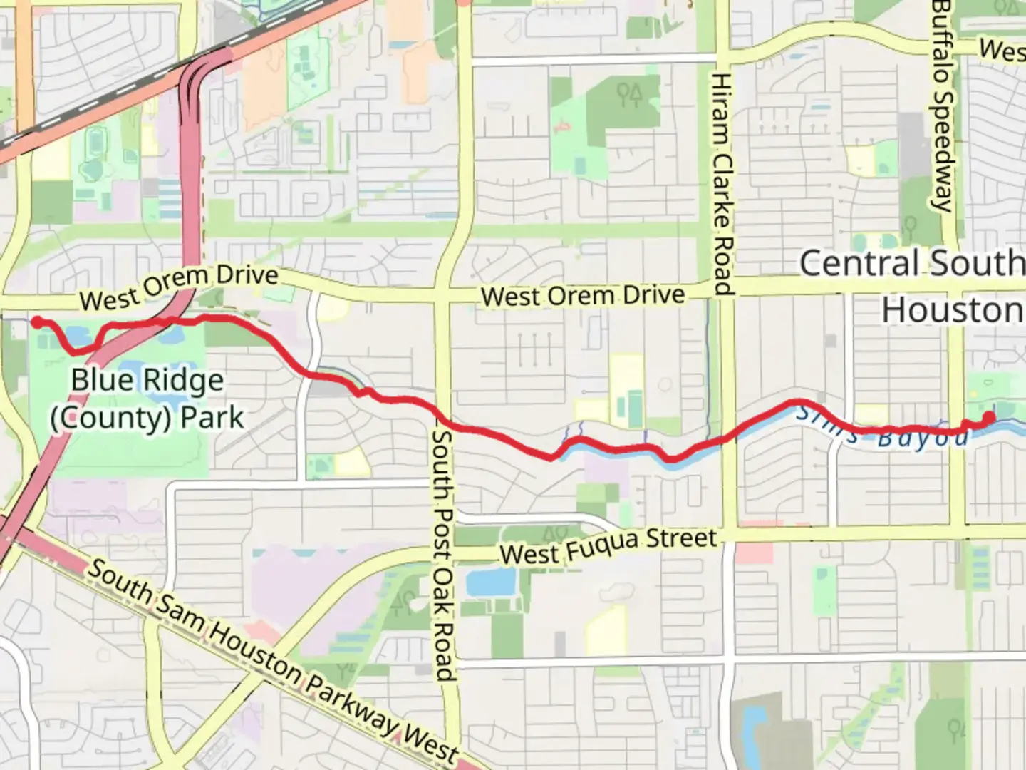 An image depicting the trail Sims Bayou Greenway and its surrounding area.