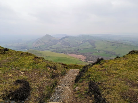 Baby Dragons Back taking in Hope Bowdler, Caer Caradoc and The Lawley