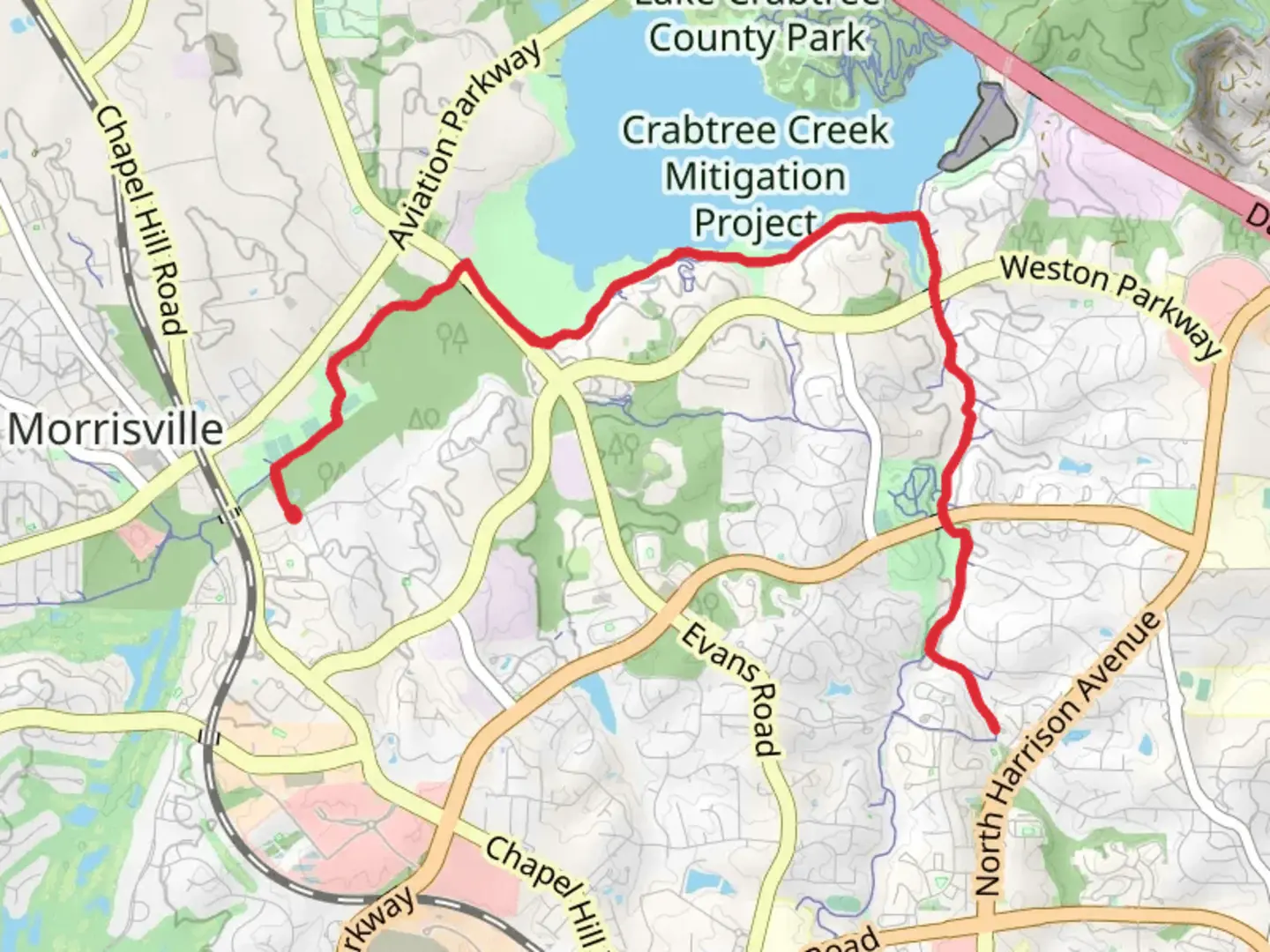 An image depicting the trail Crabtree Creek Greenway and Black Creek Greenway and its surrounding area.