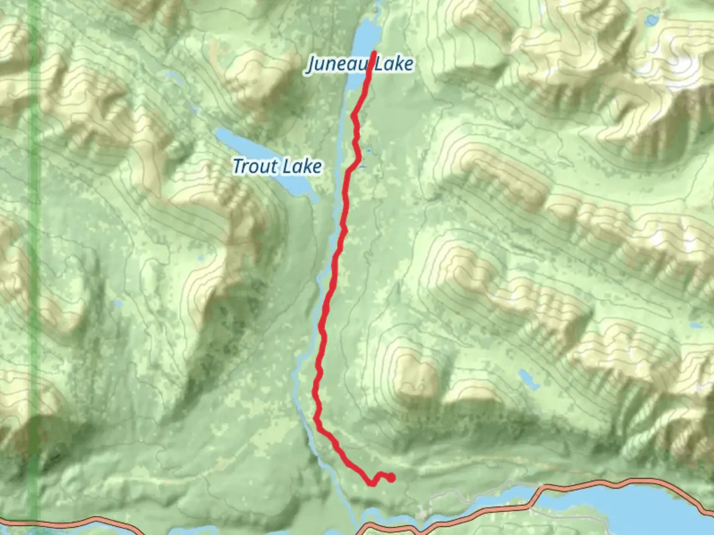 An image depicting the trail Juneau Lake and its surrounding area.