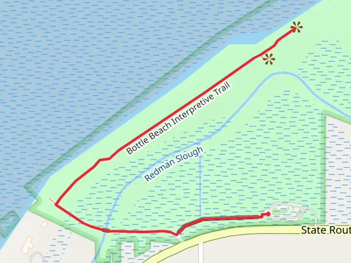 An image depicting the trail Bottle Beach Interpretive Trail and its surrounding area.