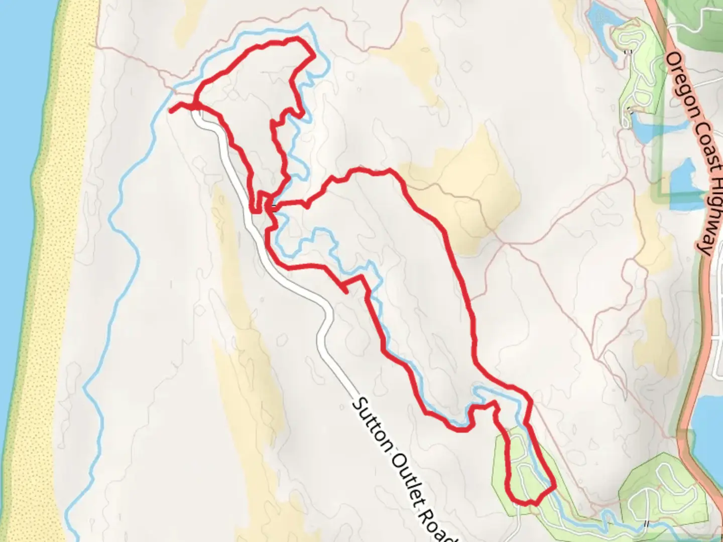 An image depicting the trail Sutton Beach Dunes Loop Trail and its surrounding area.