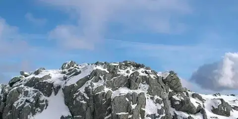 An image depicting the trail Meall an Fhudair Loop via Troisgeach Mount and its surrounding area.