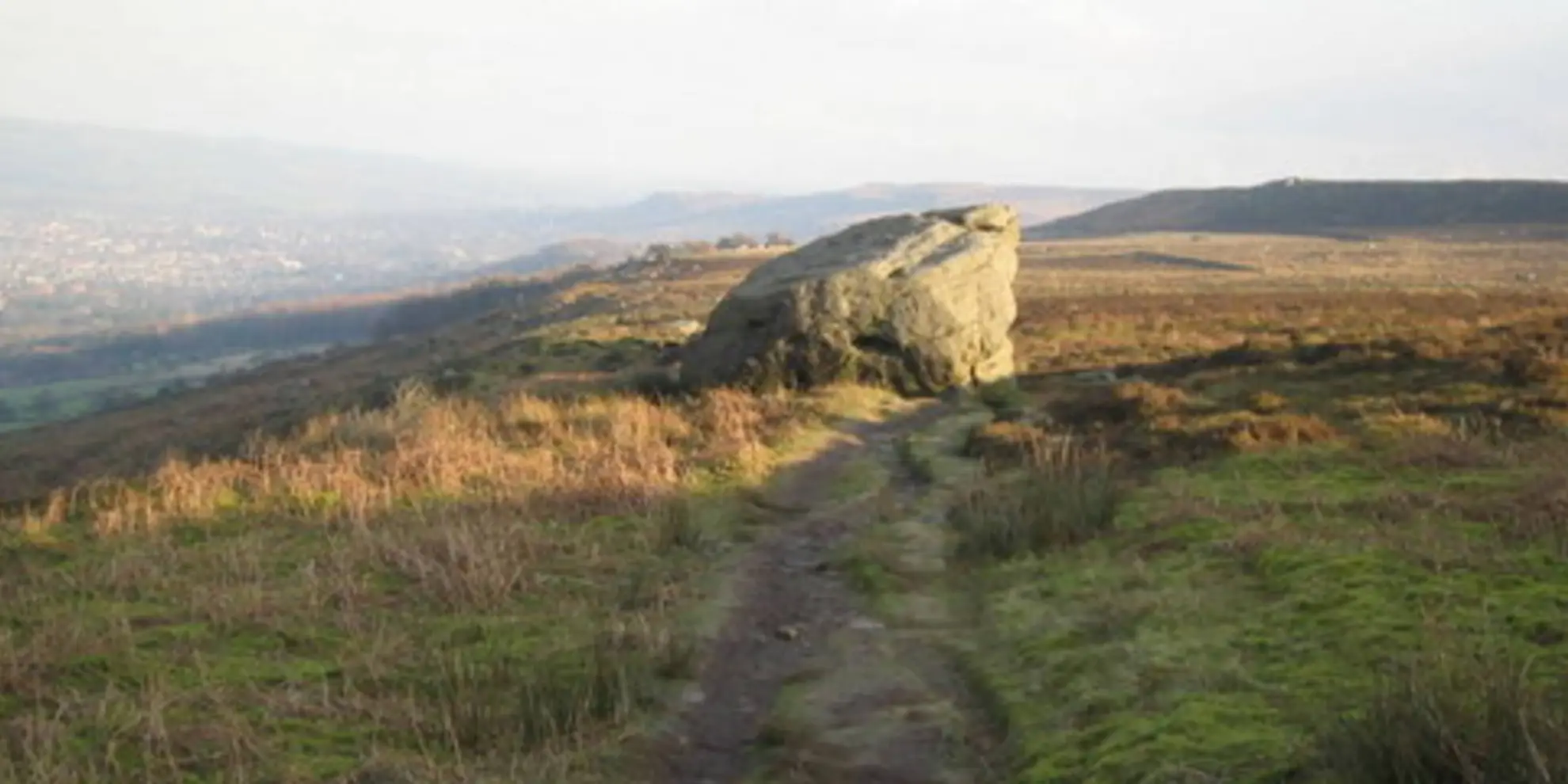 An image depicting the trail Addingham High Moor - Windgate Nick - Black Hill and the Doubler Stones and its surrounding area.