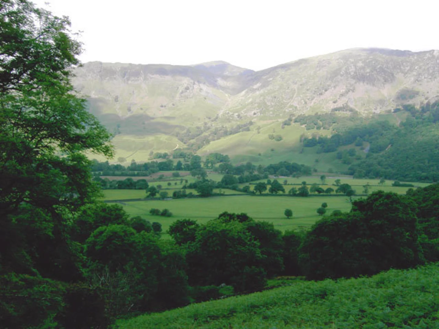An image depicting the trail King's How - High Spy Loop from Grange and its surrounding area.