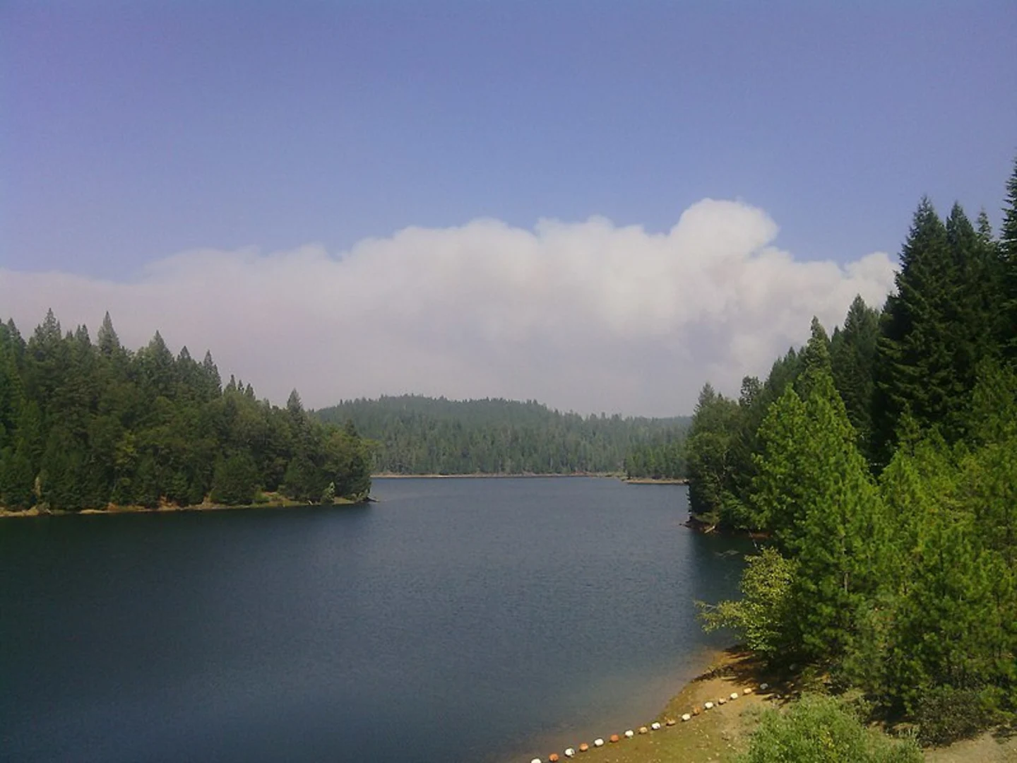 An image depicting the trail Rocky Ridge to Sugar Pine Reservoir and its surrounding area.