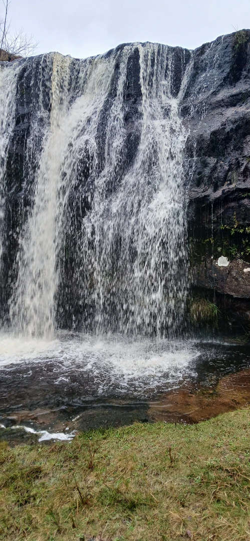 An image depicting the trail Doon waterfall and its surrounding area.