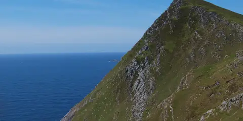 An image depicting the trail Croaghaun SW Summit and its surrounding area.