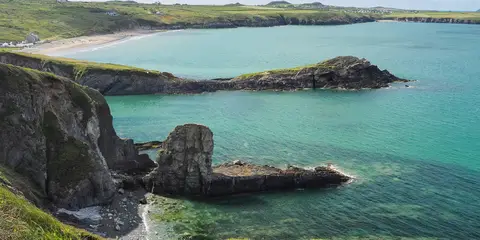 An image depicting the trail Penberry and St Davids Head from Whitesands Bay and its surrounding area.
