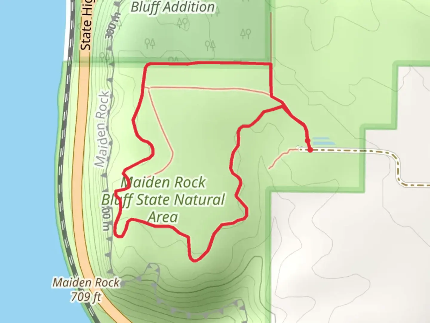An image depicting the trail Maiden Rock Bluff State Natural Area Loop Trail and its surrounding area.