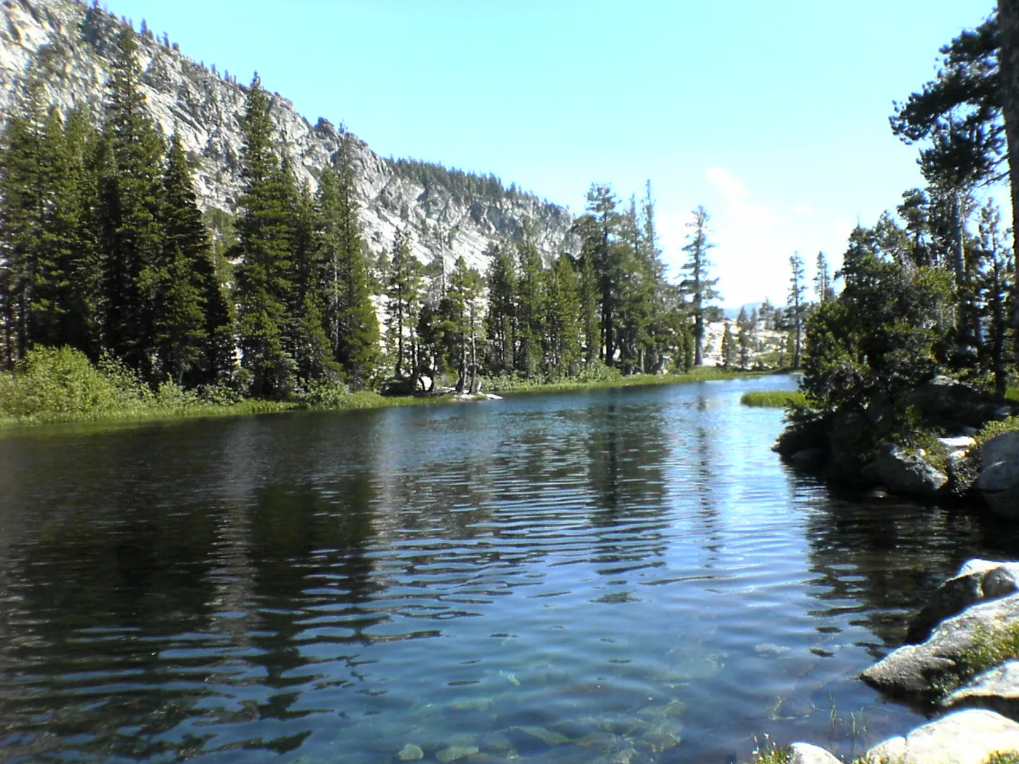 An image depicting the trail Avalanche Lake and Pyramid Trail and its surrounding area.