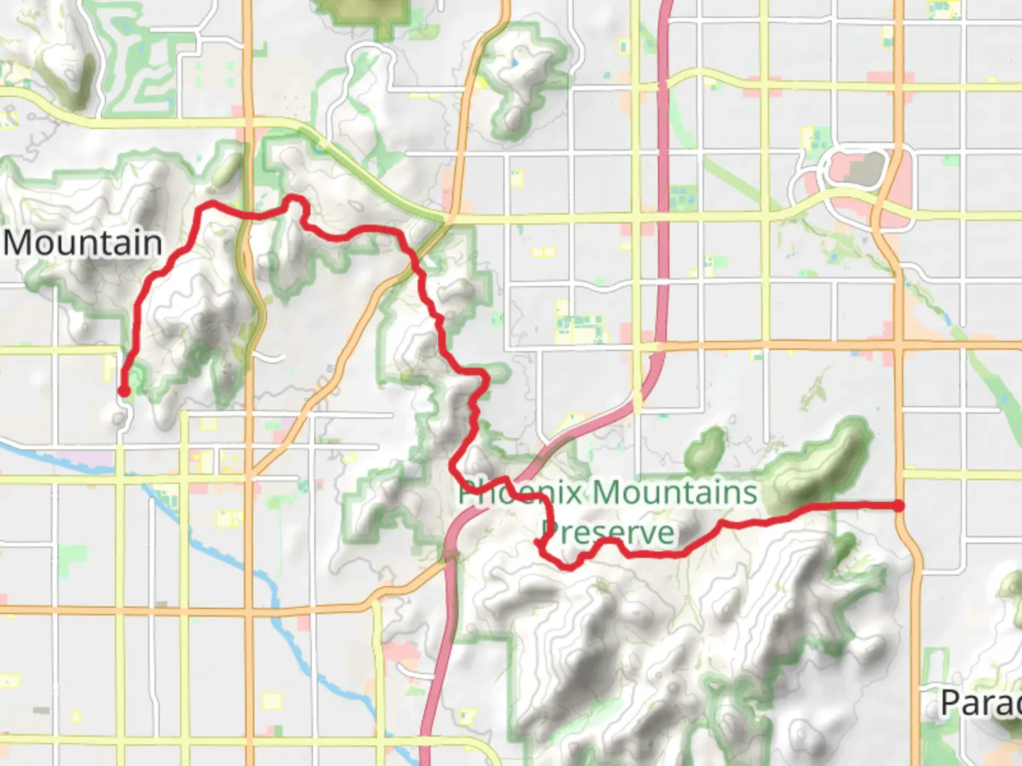 An image depicting the trail Charles M Christiansen Trail from North Tatum Boulevard and its surrounding area.