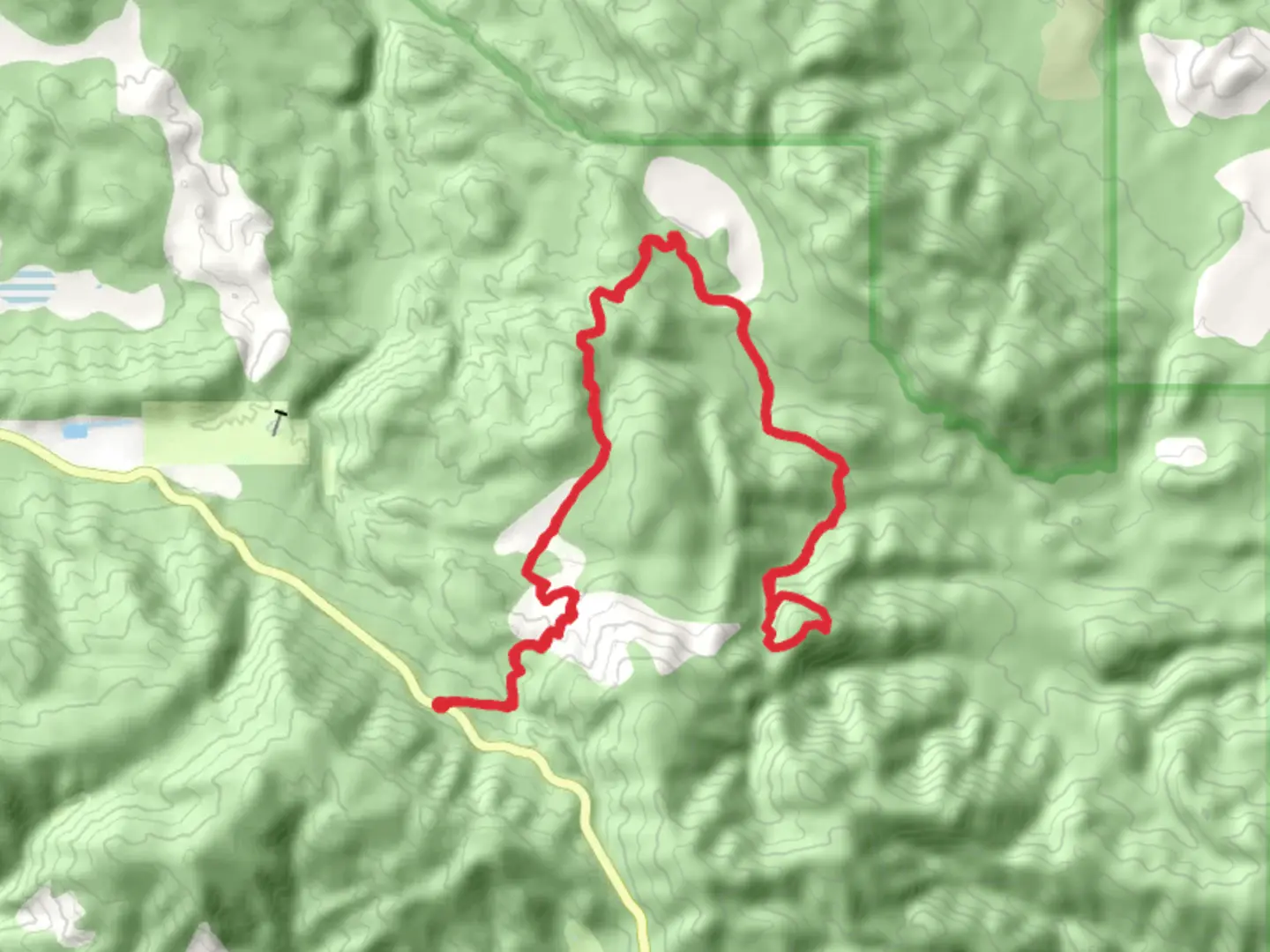 An image depicting the trail Broom Flats Road and its surrounding area.