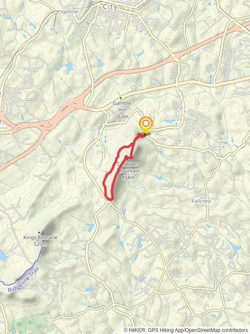 An image depicting the trail Crowders Mountain and Crowders Loop Trail and its surrounding area.