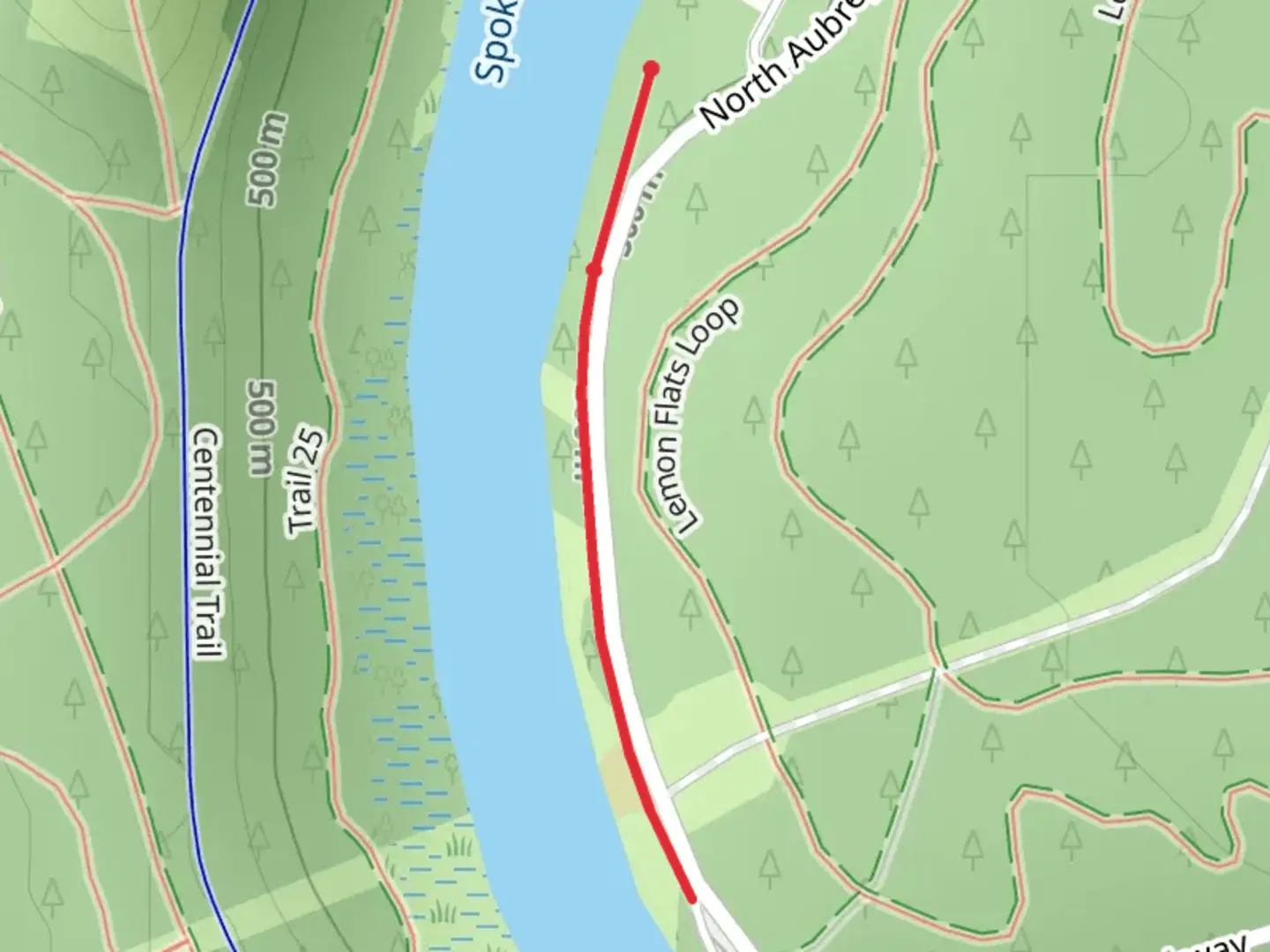 An image depicting the trail Spokane River and its surrounding area.