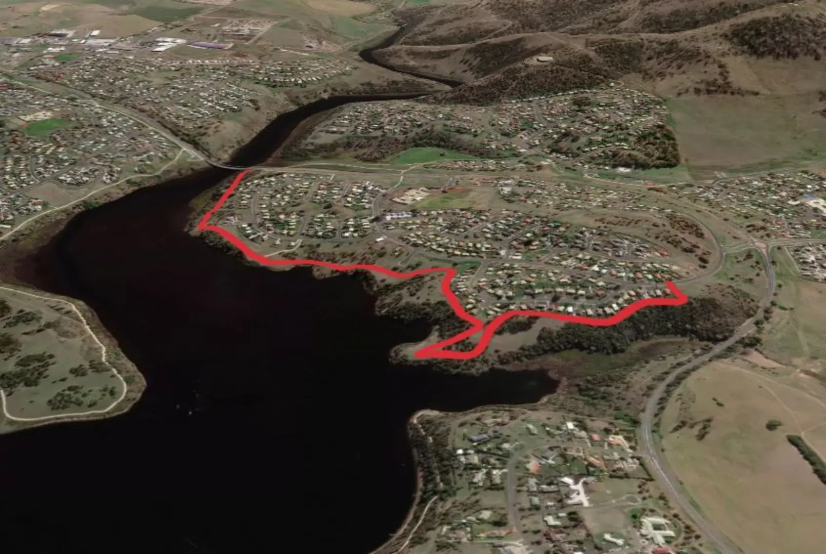 An image depicting the trail Swan Park Trail and its surrounding area.