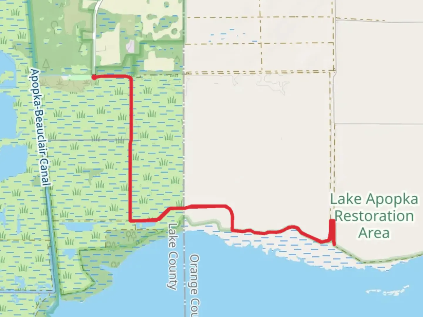 An image depicting the trail Lake Apopka Trail and its surrounding area.