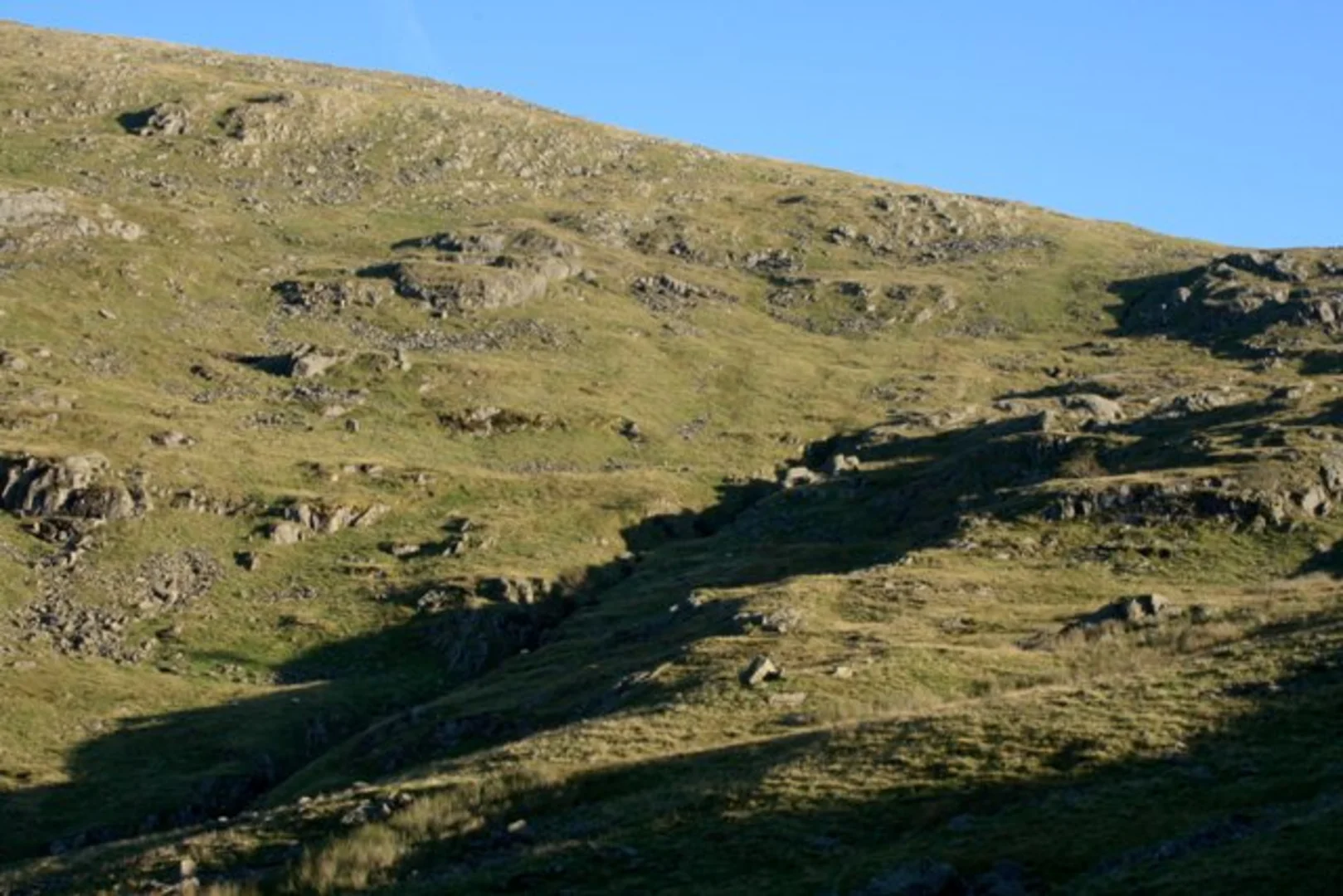 An image depicting the trail Red Screes Walk via Kilnshaw Chimney and its surrounding area.