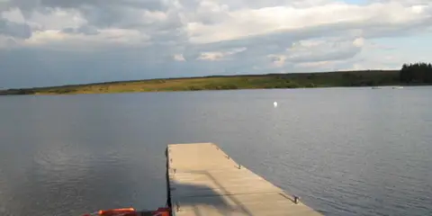 An image depicting the trail Leaholm Moor from Scaling Dam and its surrounding area.