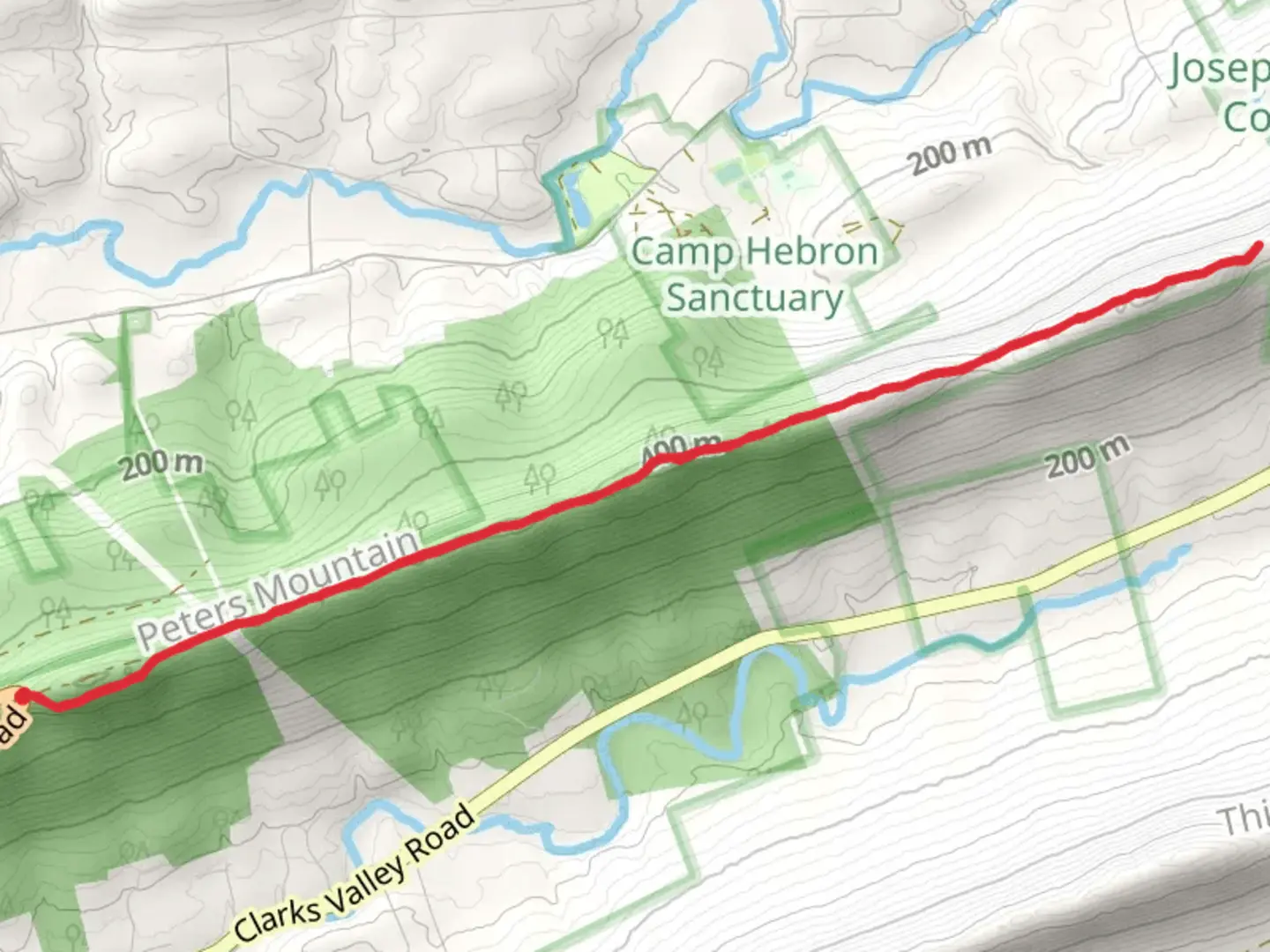An image depicting the trail Appalachian National Scenic Trail via Peters Mountain Road and its surrounding area.