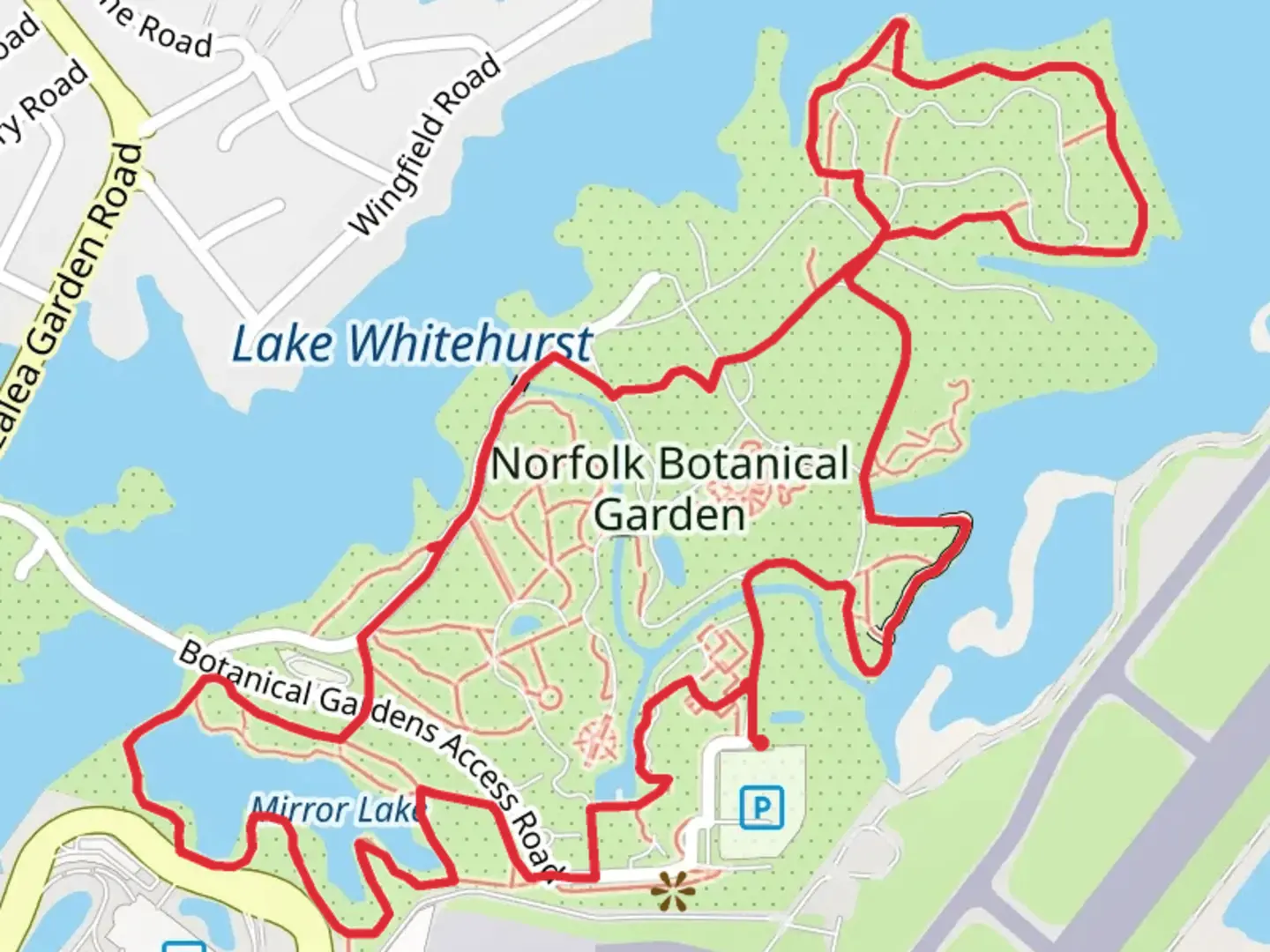 An image depicting the trail Norfolk Botanical Garden and Mirror Lake Loop and its surrounding area.