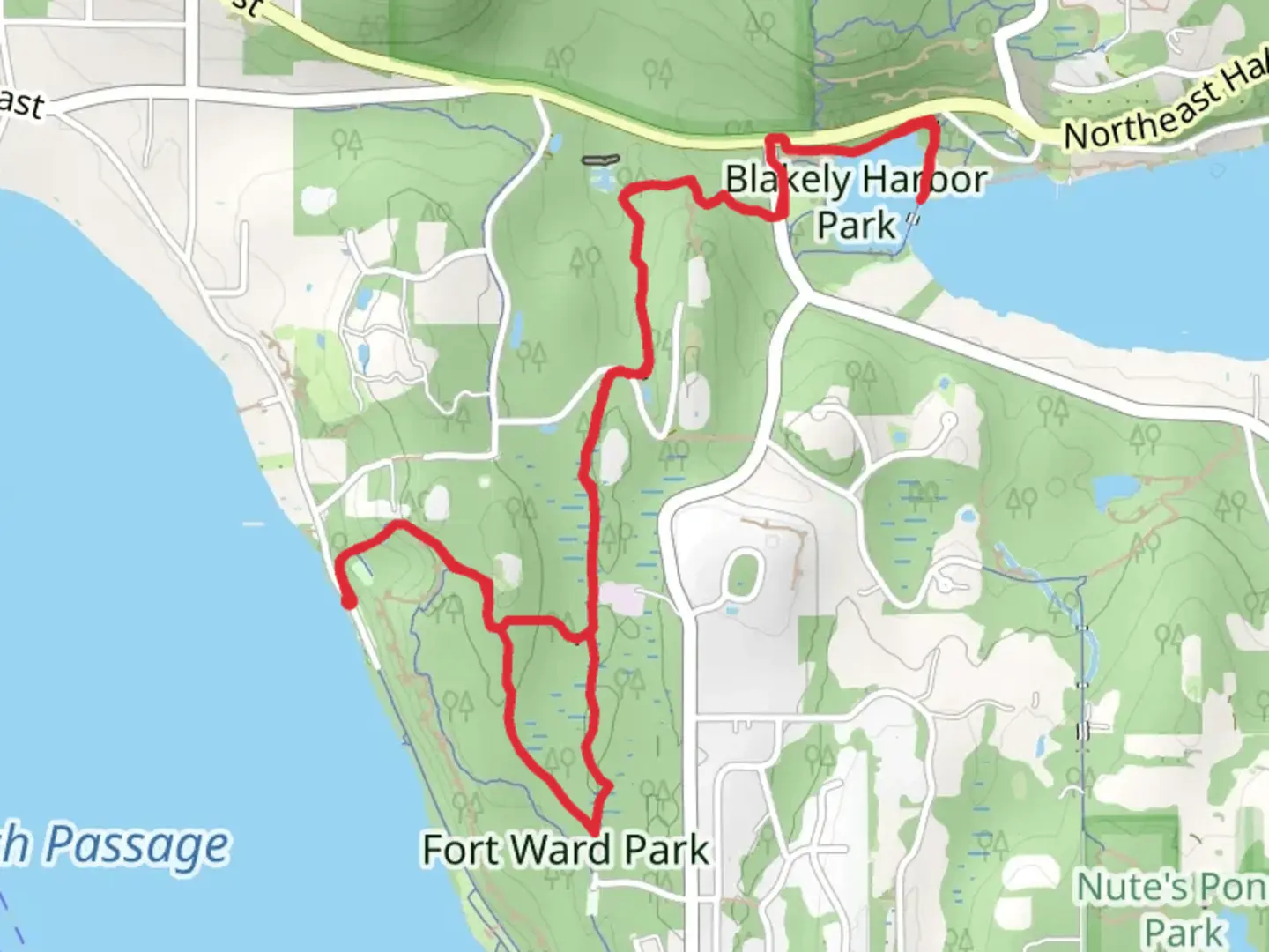 An image depicting the trail Blakely Harbor via Fort Ward Hill Trail and its surrounding area.