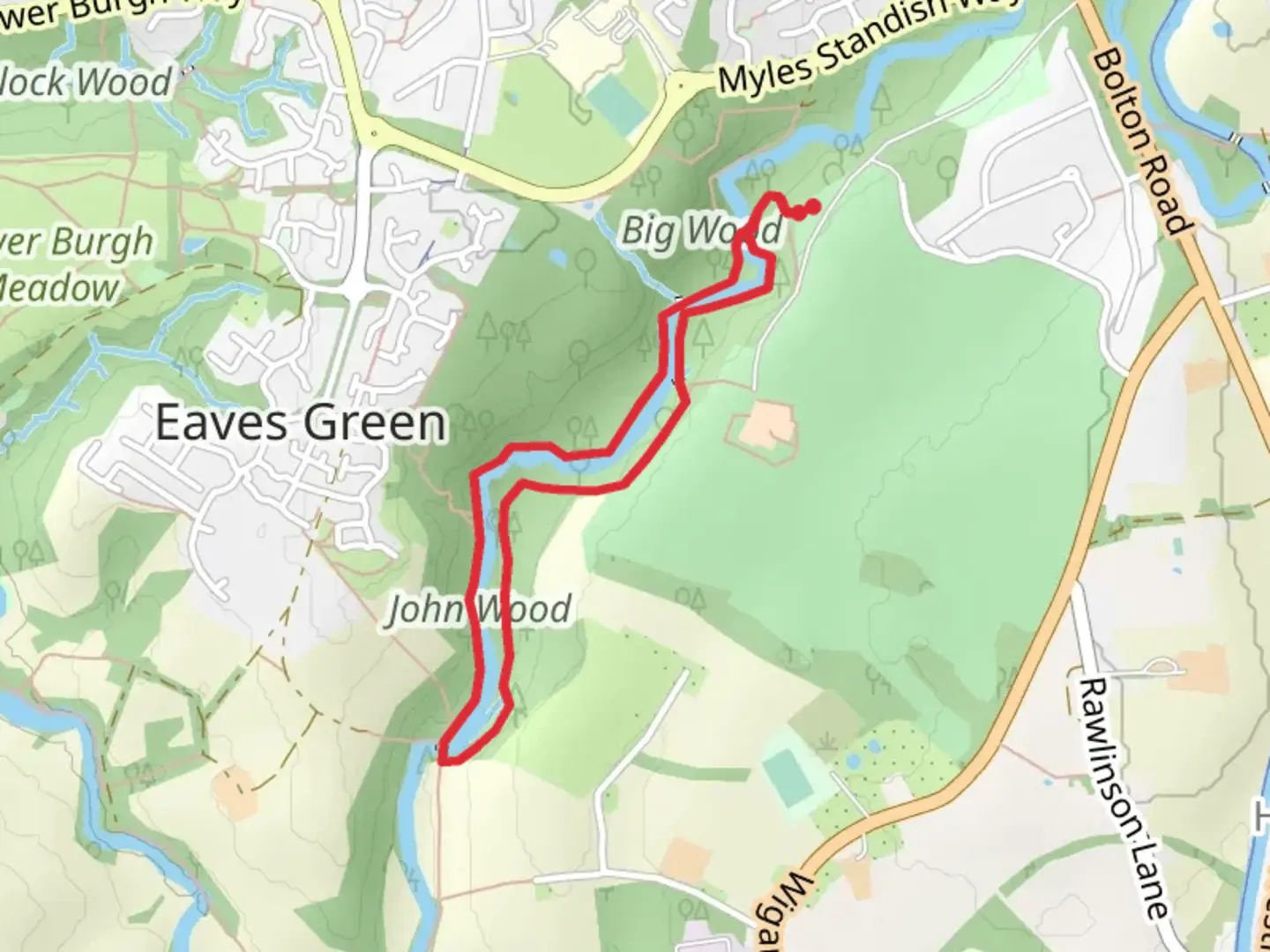 An image depicting the trail Duxbury Woods and its surrounding area.