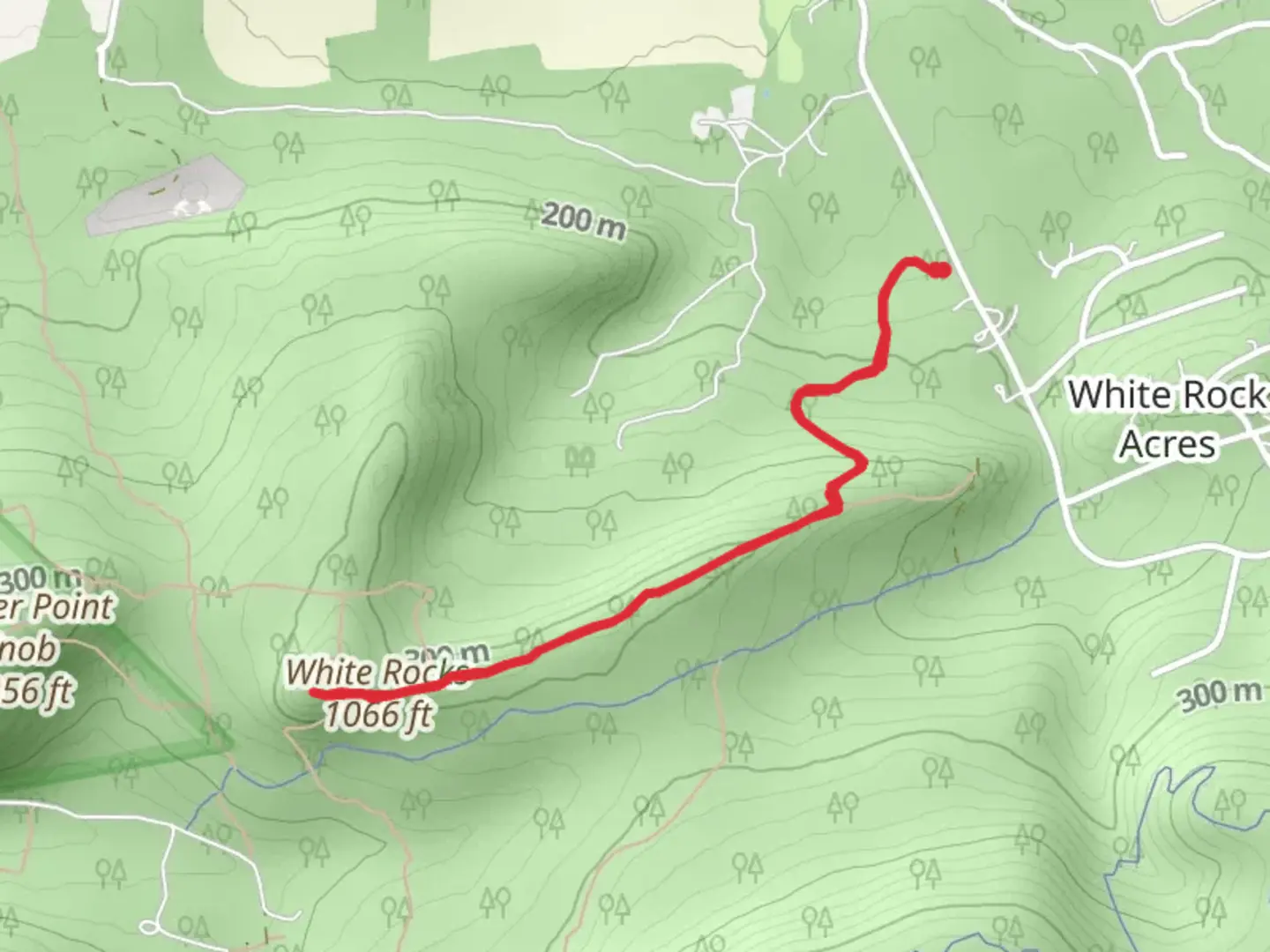 An image depicting the trail White Rocks and its surrounding area.