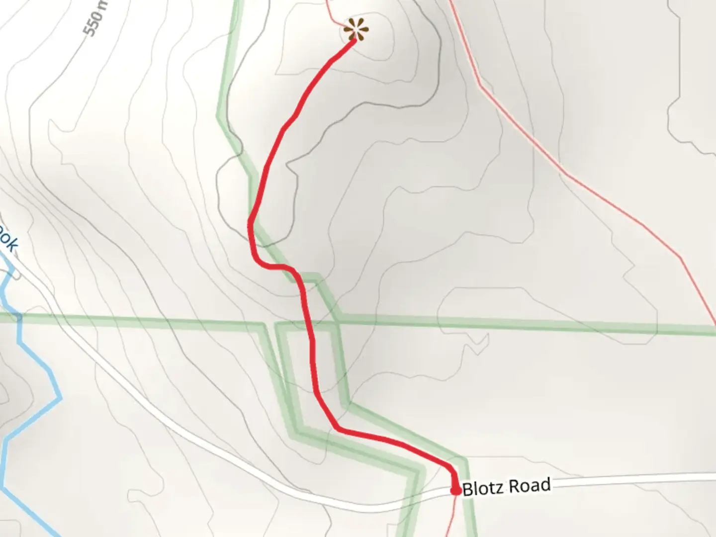 An image depicting the trail Warner Hill from Blotz Road and its surrounding area.