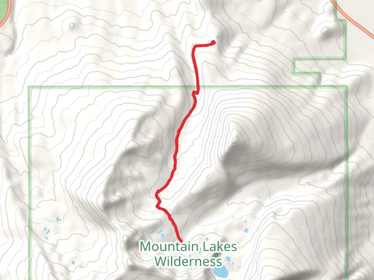 An image depicting the trail Lake Como via Varney Creek Trail and its surrounding area.