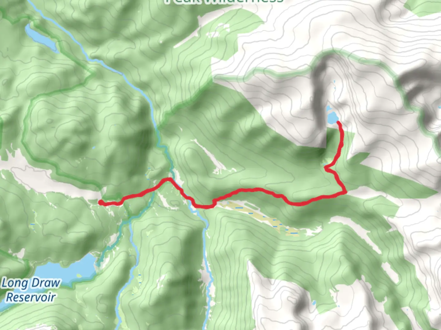 An image depicting the trail Mirror Lake via Corral Creek Trail and its surrounding area.